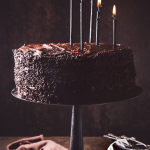 dark & stormy chocolate layer cake with fudge icing