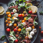 arugula tomato salad with lemony pesto dressing
